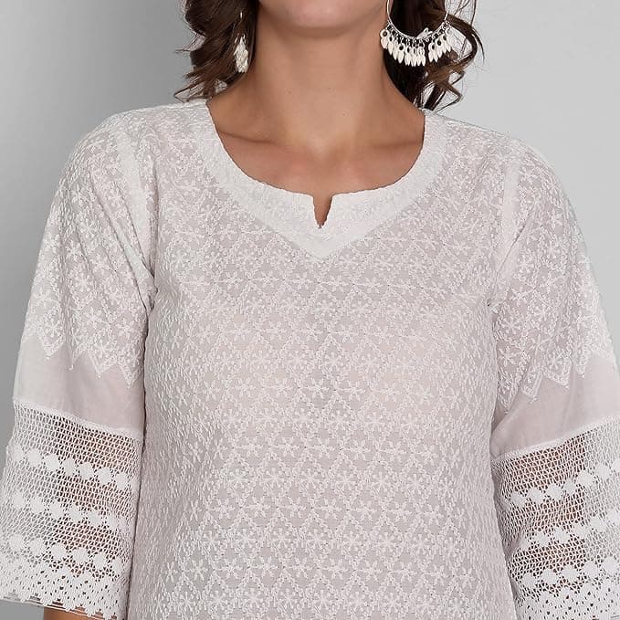 Woman wearing a grey party wear ethnic kurta style by Nishtha Chadda