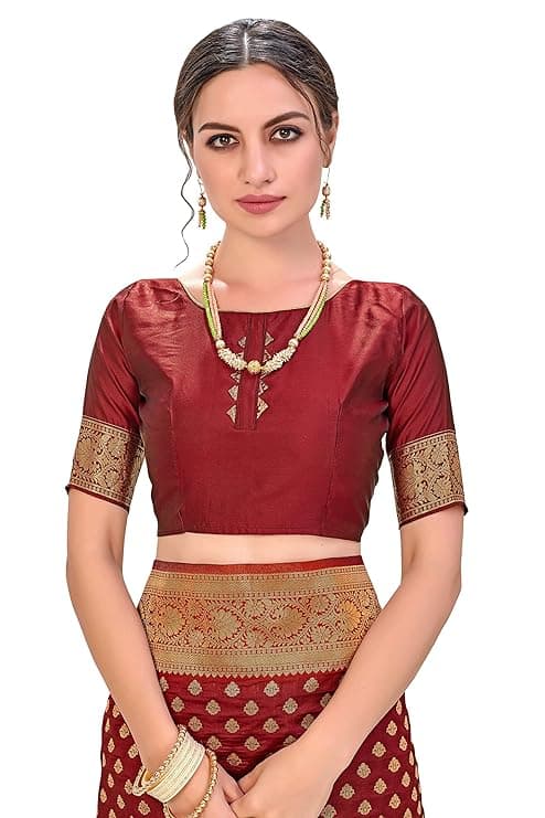 Woman wearing a maroon party wear ethnic kurta style by Nishtha Chadda