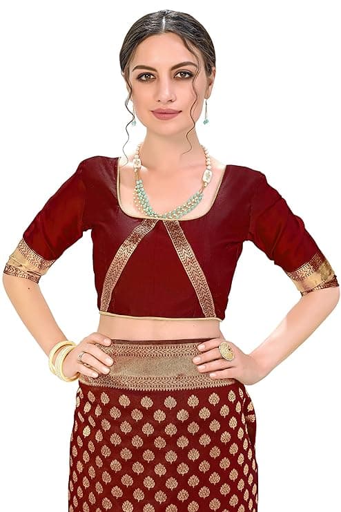 Woman wearing a maroon party wear ethnic kurta style by Nishtha Chadda
