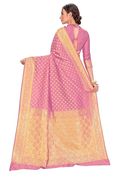 Woman wearing a beige party wear ethnic kurta style by Nishtha Chadda