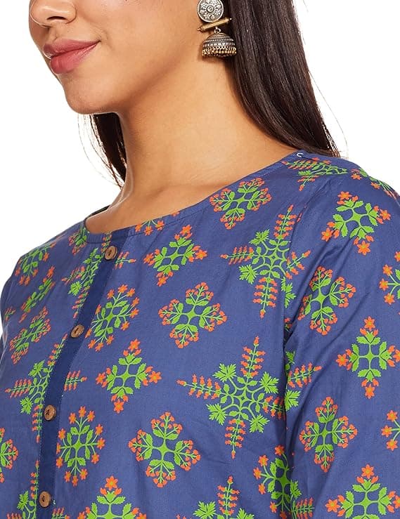 Woman wearing a mustard party wear ethnic kurta style by Nishtha Chadda
