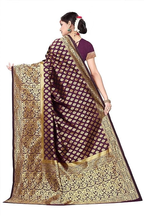 Woman wearing a brown party wear ethnic kurta style by Nishtha Chadda