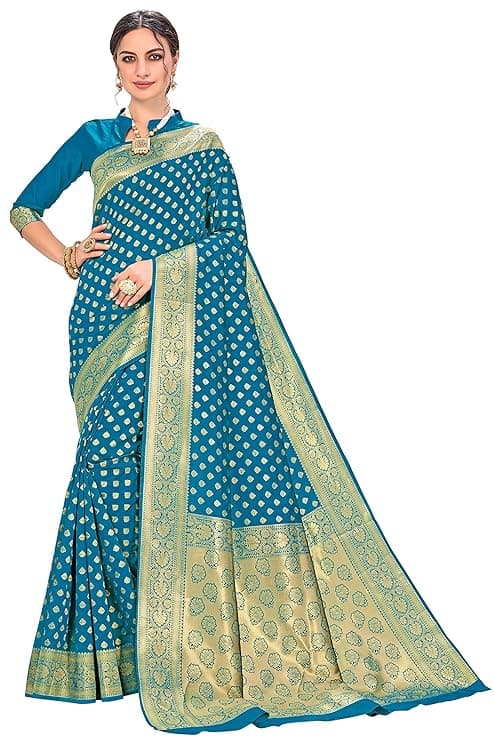 Woman wearing a teal party wear ethnic kurta style by Nishtha Chadda