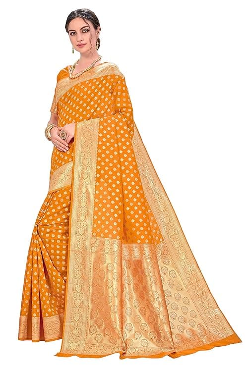 Woman wearing a orange party wear ethnic kurta style by Nishtha Chadda