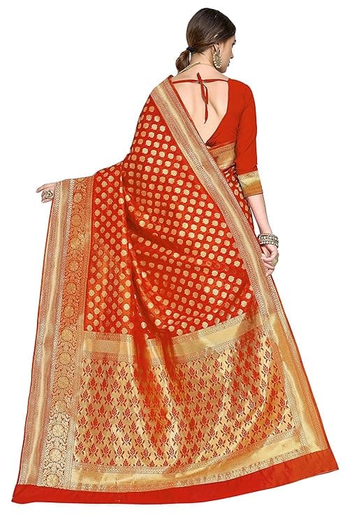 Woman wearing a red party wear ethnic kurta style by Nishtha Chadda