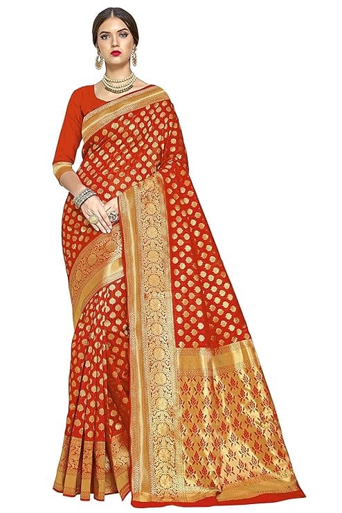 Woman wearing a red party wear ethnic kurta style by Nishtha Chadda