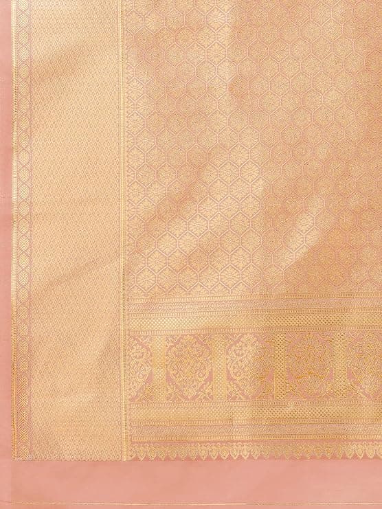 Woman wearing a beige party wear ethnic kurta style by Nishtha Chadda