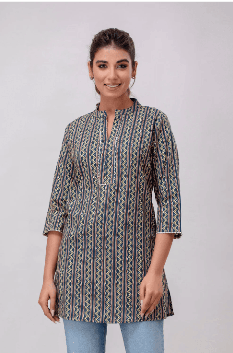 Woman wearing a grey indian kurti for women by Nishtha Chadda