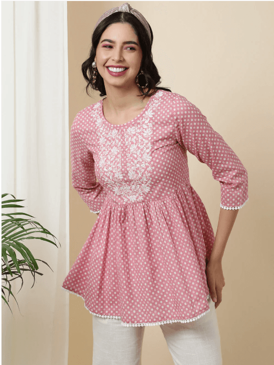 Woman wearing a grey indian kurti for women by Nishtha Chadda