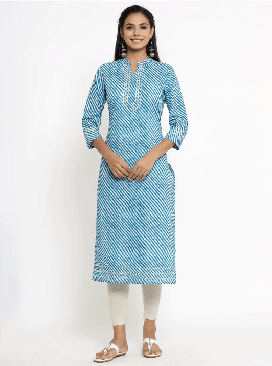 Woman wearing a grey indian kurti for women by Nishtha Chadda