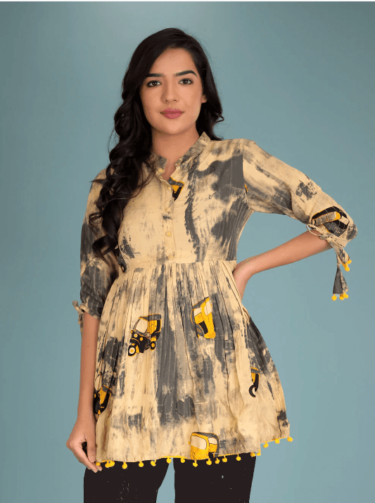 Woman wearing a grey indian kurti for women by Nishtha Chadda