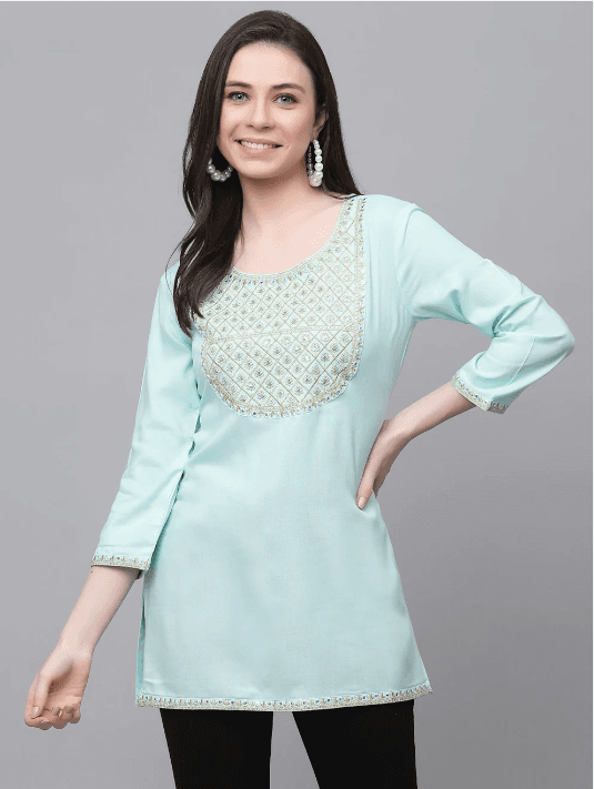 Woman wearing a grey indian kurti for women by Nishtha Chadda
