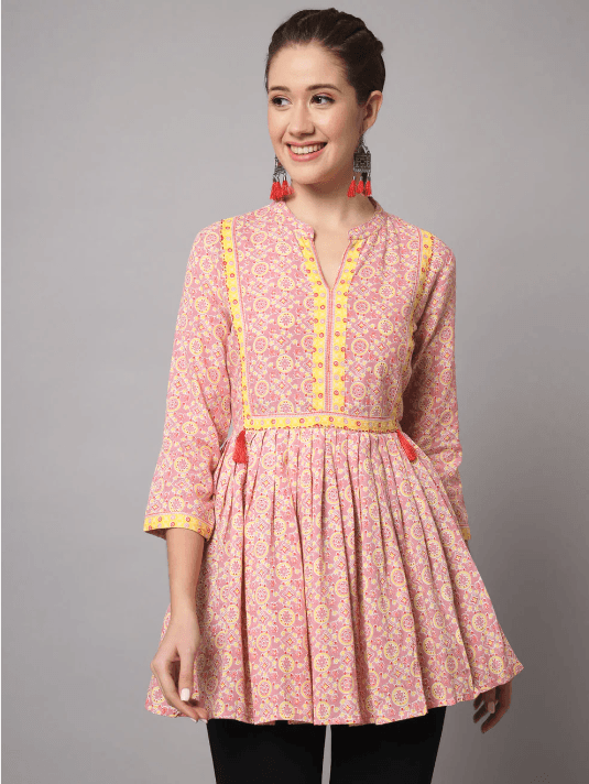 Woman wearing a grey indian kurti for women by Nishtha Chadda