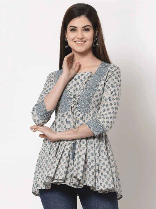 Woman wearing a grey indian kurti for women by Nishtha Chadda