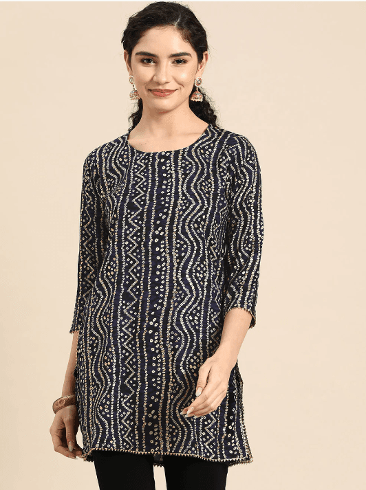 Woman wearing a grey indian kurti for women by Nishtha Chadda