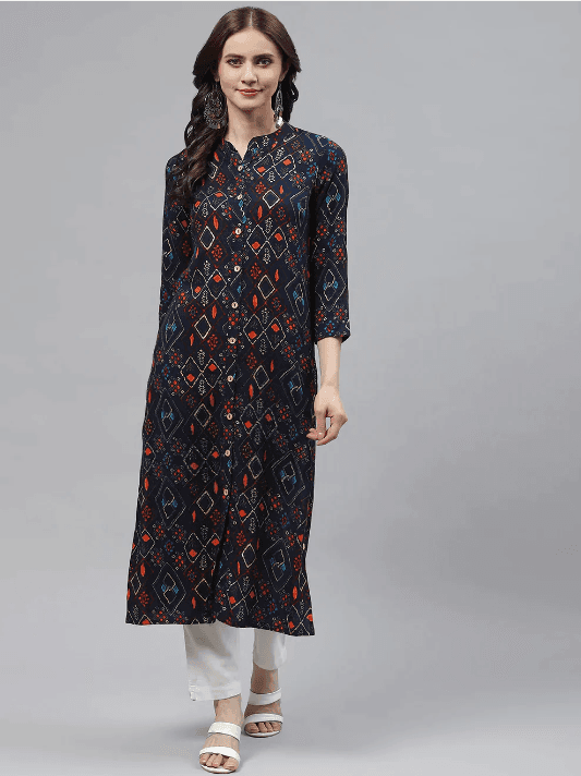 Woman wearing a brown indian kurti for women by Nishtha Chadda