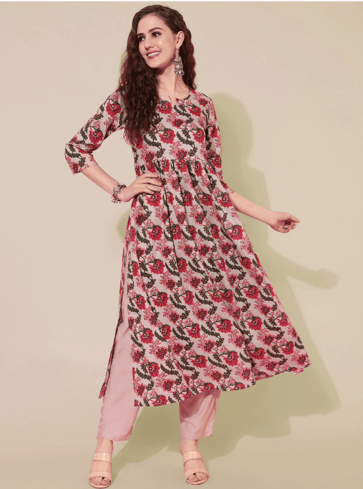 Woman wearing a brown indian kurti for women by Nishtha Chadda