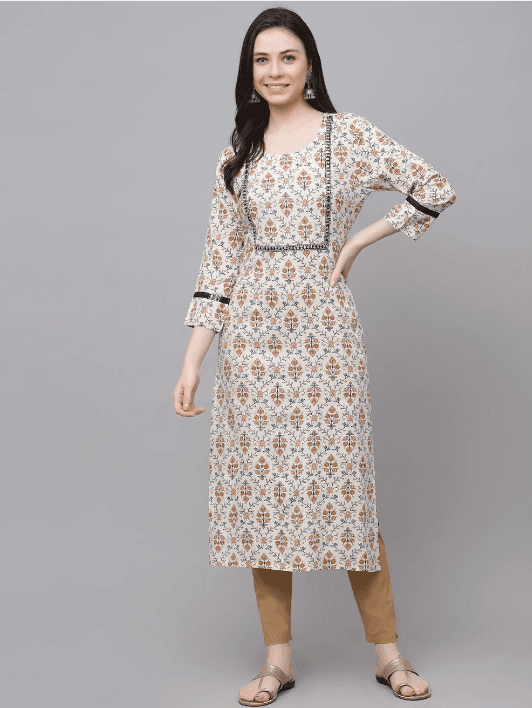 Woman wearing a grey indian kurti for women by Nishtha Chadda