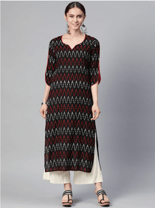 Woman wearing a brown indian kurti for women by Nishtha Chadda