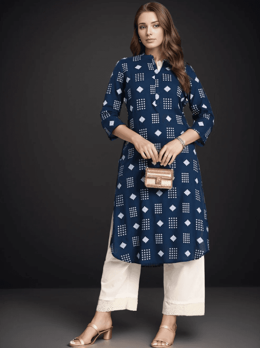 Woman wearing a navy indian kurti for women by Nishtha Chadda
