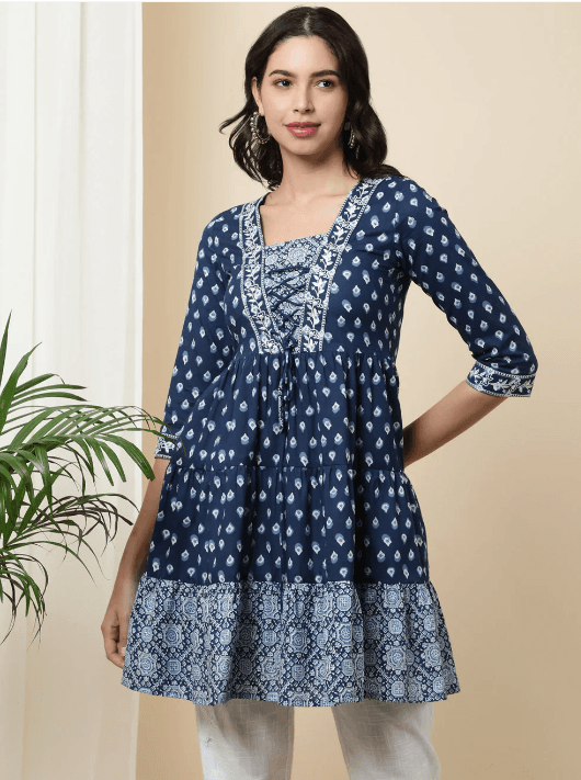 Woman wearing a navy indian kurti for women by Nishtha Chadda