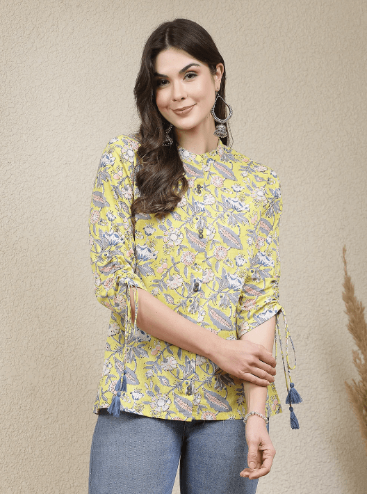 Woman wearing a grey indian kurti for women by Nishtha Chadda