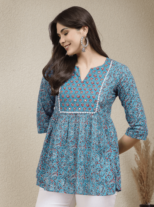 Woman wearing a grey indian kurti for women by Nishtha Chadda