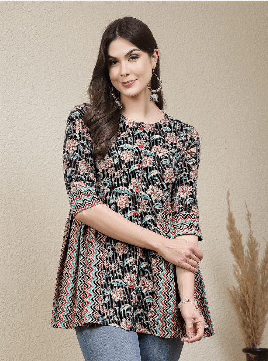 Woman wearing a brown indian kurti for women by Nishtha Chadda