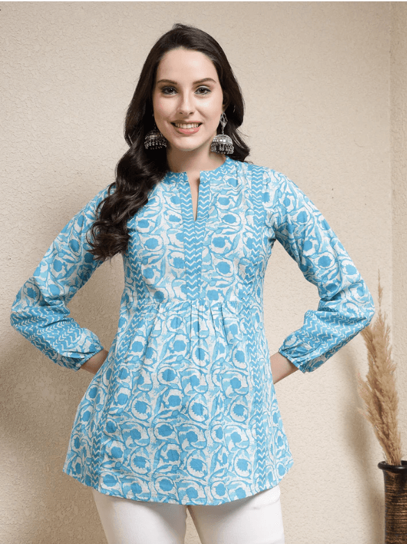 Woman wearing a grey indian kurti for women by Nishtha Chadda