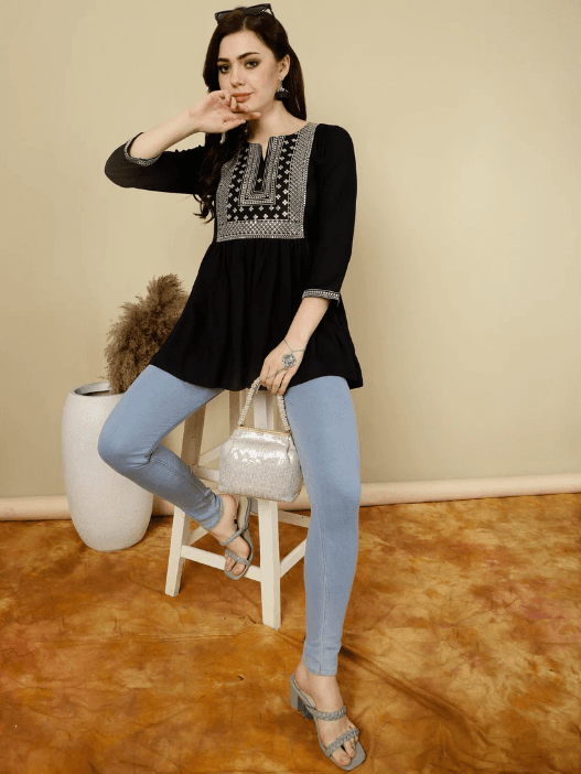 Woman wearing a brown indian kurti for women by Nishtha Chadda