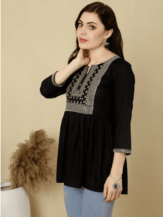 Woman wearing a brown indian kurti for women by Nishtha Chadda