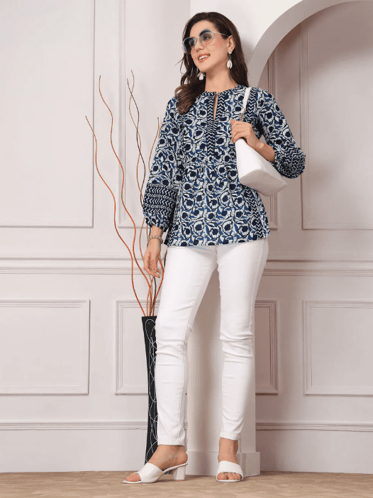 Woman wearing a grey indian kurti for women by Nishtha Chadda