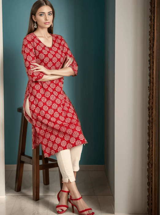Woman wearing a brown indian kurti for women by Nishtha Chadda