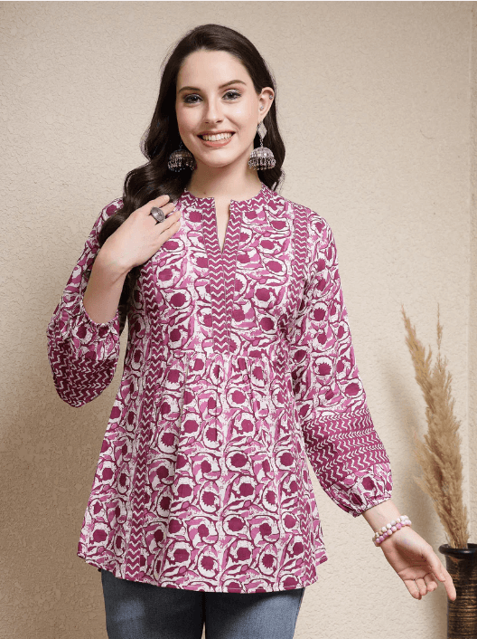 Woman wearing a brown indian kurti for women by Nishtha Chadda
