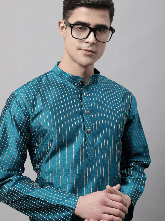 Model wearing a teal party wear kurta by Nishtha Chadda