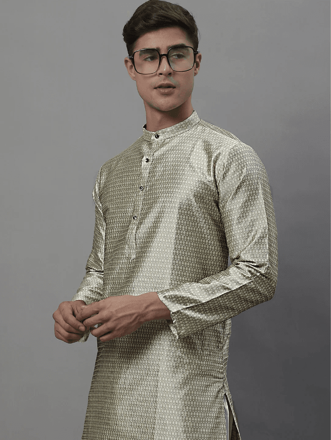 Model wearing a olive party wear kurta by Nishtha Chadda